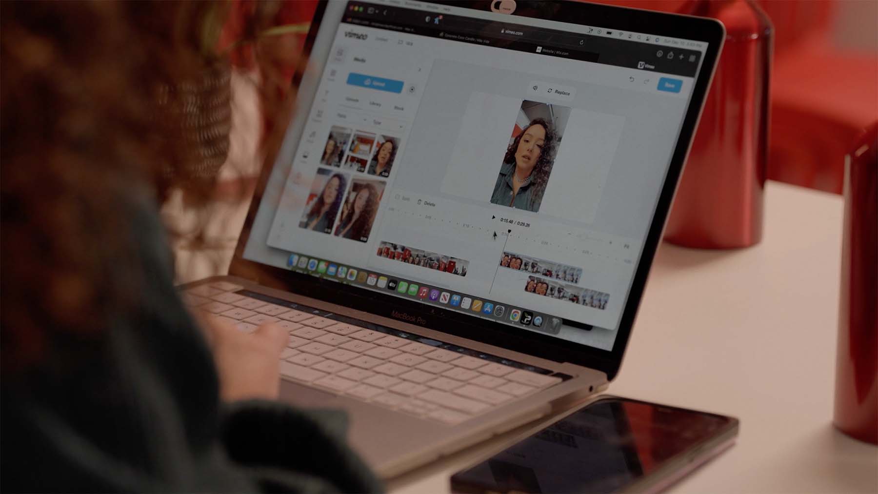 Woman editing a video on a laptop